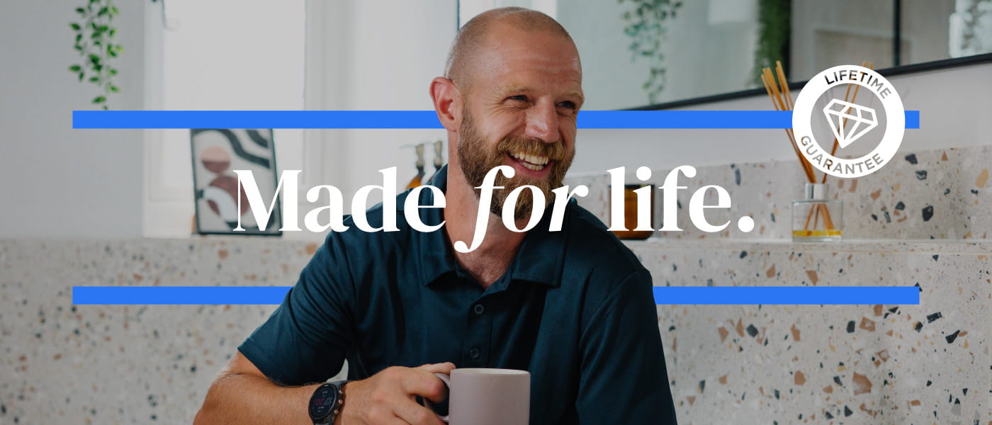 Professional installer fitting Bristan products in a modern bathroom, with the Bristan Made for life campaign message