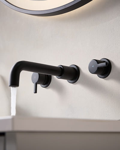 Close-up of hands being washed under a Bristan kitchen tap with Thermaclick technology
