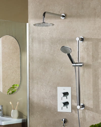 Close-up of hands being washed under a Bristan kitchen tap with Thermaclick technology