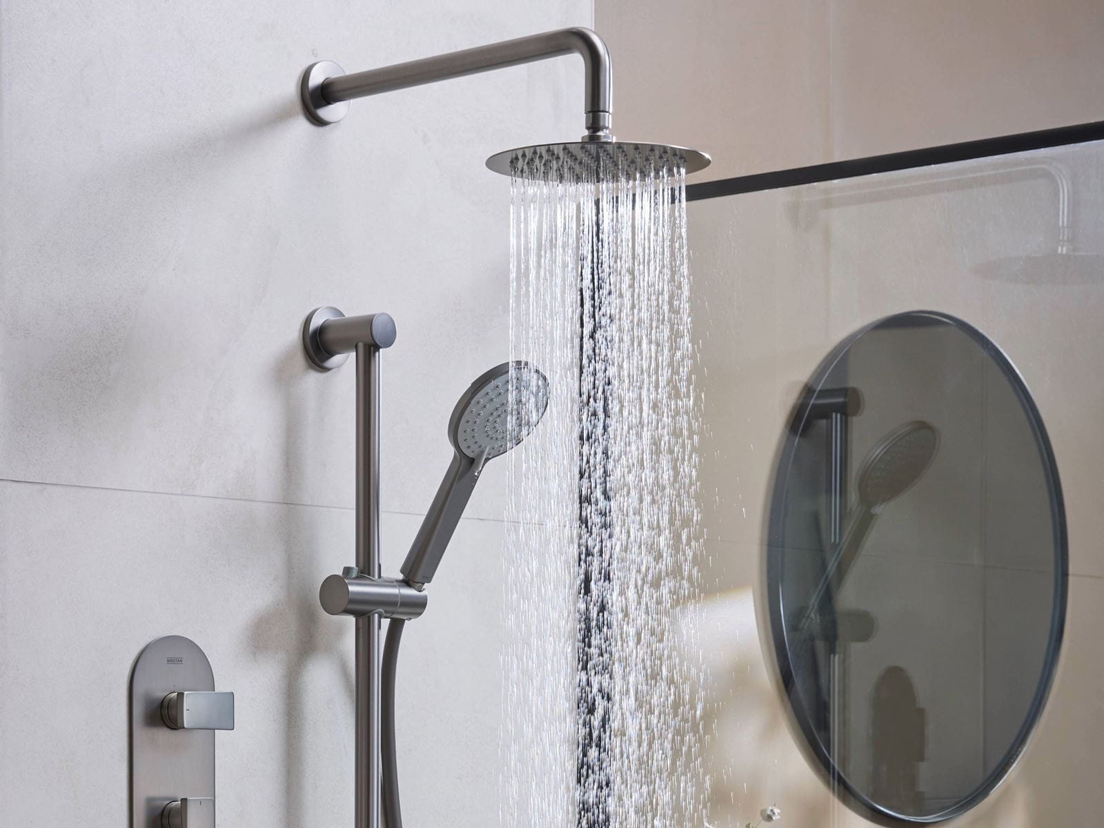 Bristan Frammento shower pack in gun metal grey installed in a contemporary bathroom