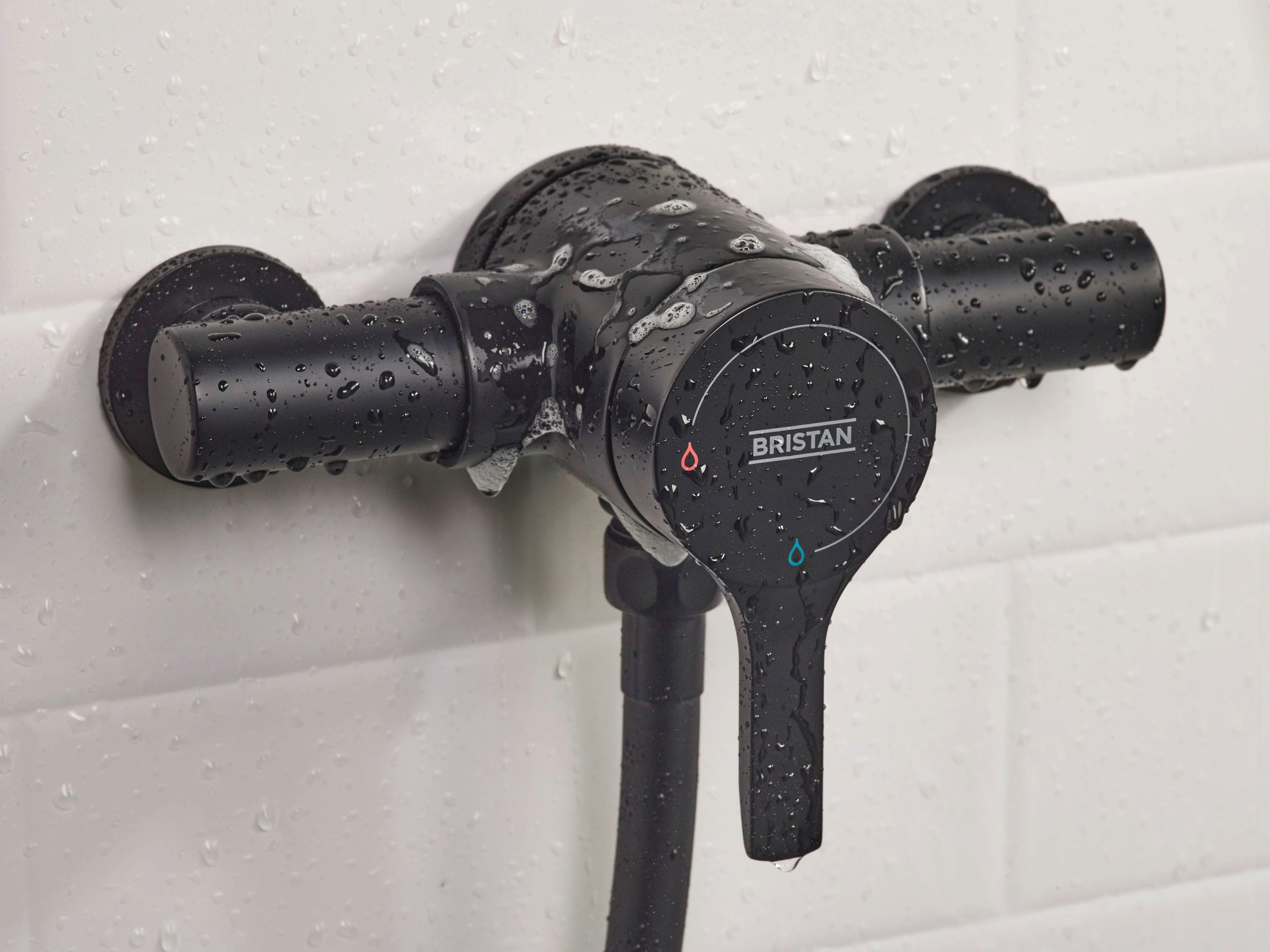 Bristan Capri mini valve shower with adjustable riser rail and handset in a contemporary bathroom